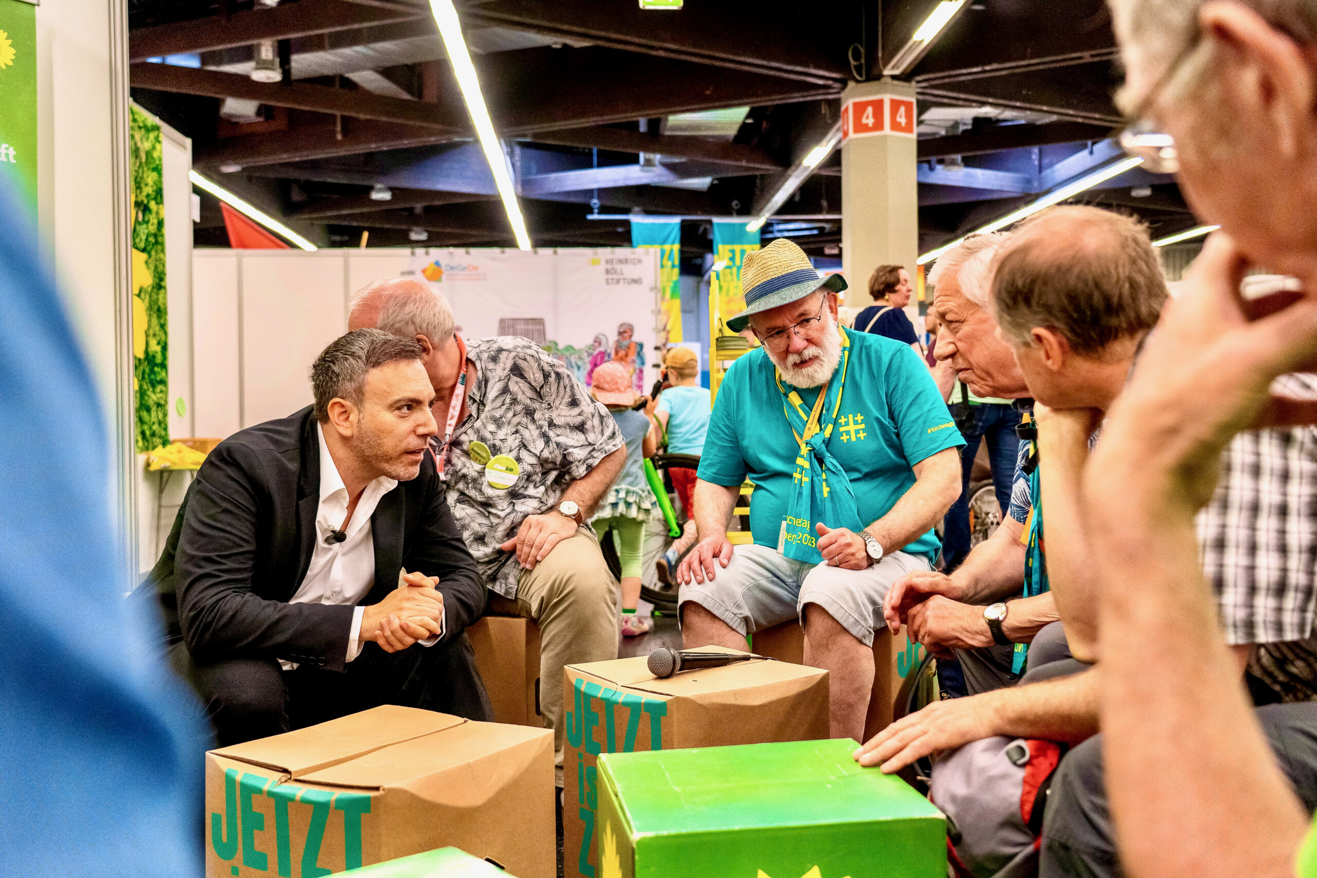 Sergey Lagodinsky speaking with participants at Kirchentag, 2023